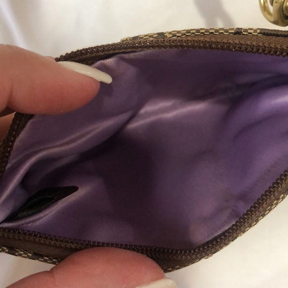 Tan and gold Coach wristlet with purple lining - Picture 4 of 4
